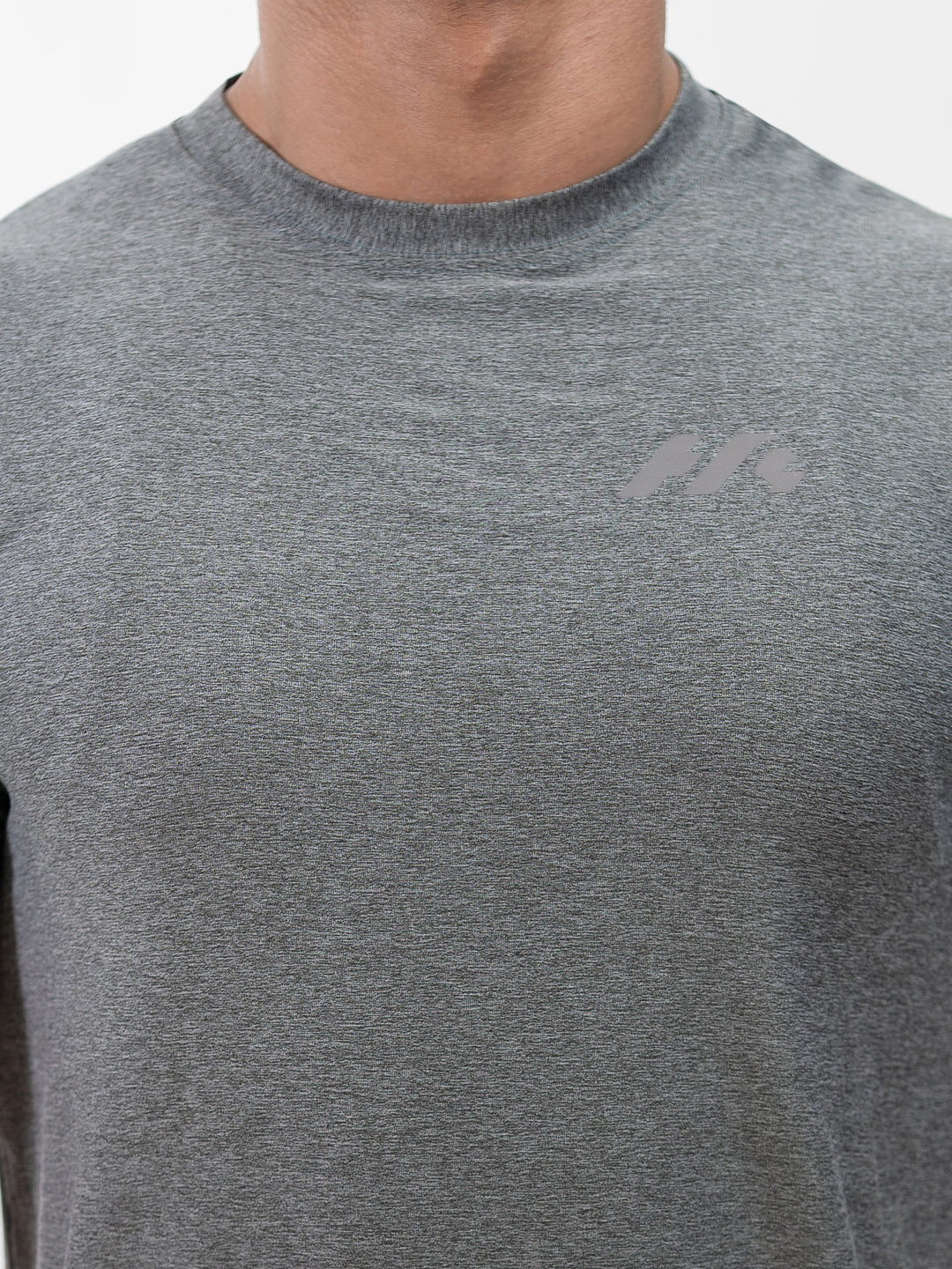 Male athlete 5 ft 8 in wearing size S Herculean Metal Grey Dri-Blend Training Tee, hands on hips, front view against white background.