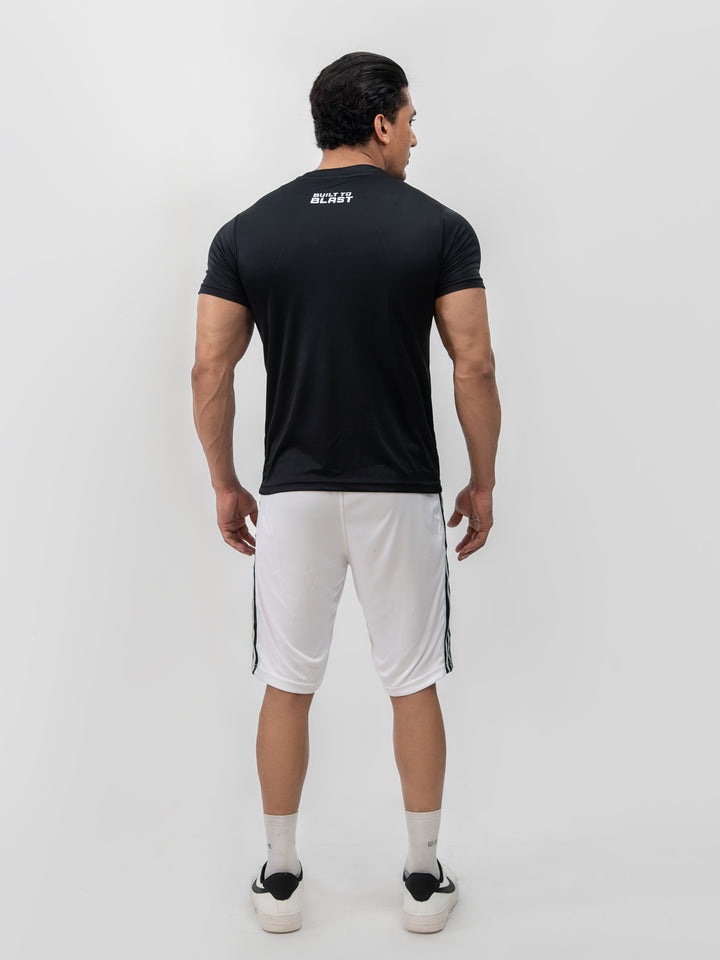 Male model wearing Knights' Performance Tee Mystic Black, size S, front view