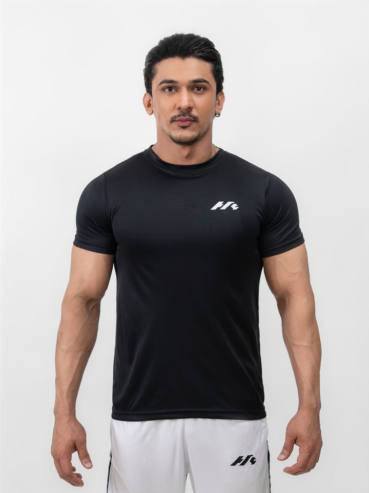 Male model wearing Knights' Performance Tee Mystic Black, size S, front view