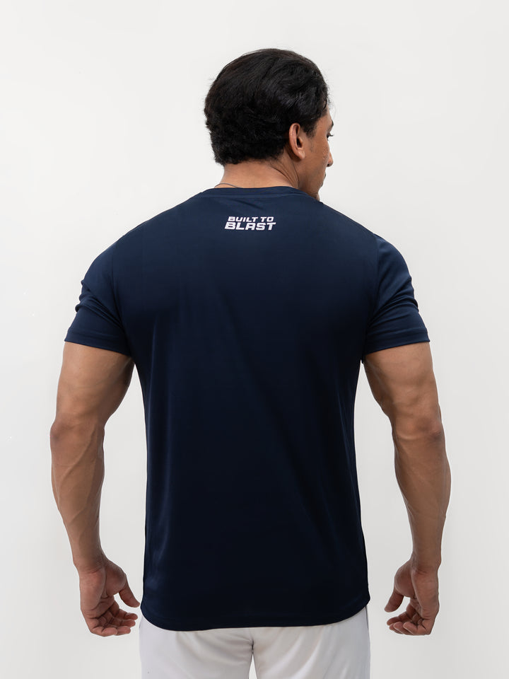 Male athlete 5 foot 8 wearing Ocean Blue dry-fit Knights’ Performance Tee in size S